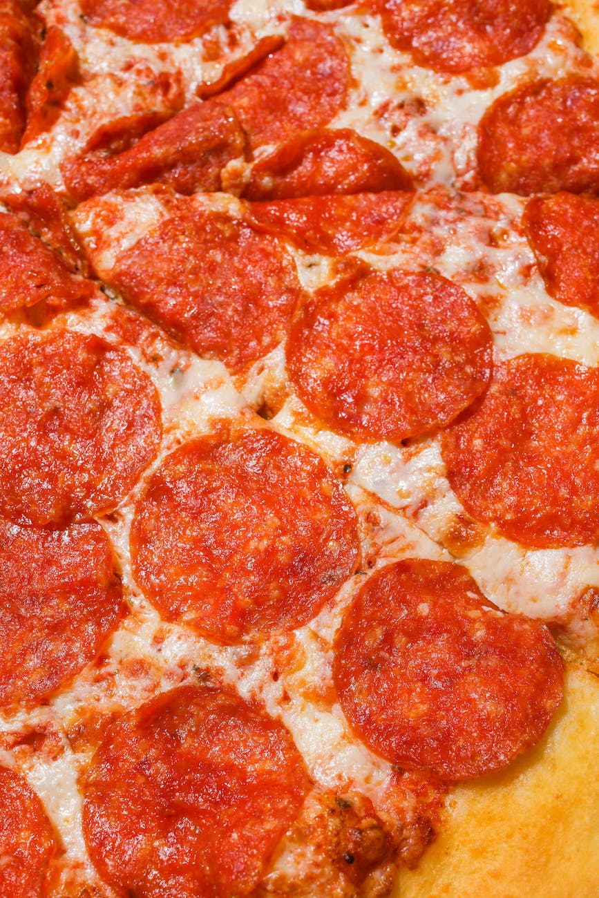 cheesy pepperoni pizza in close up view